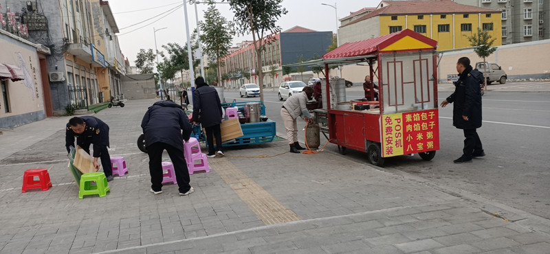 清理迎宾街口流动商贩.jpg